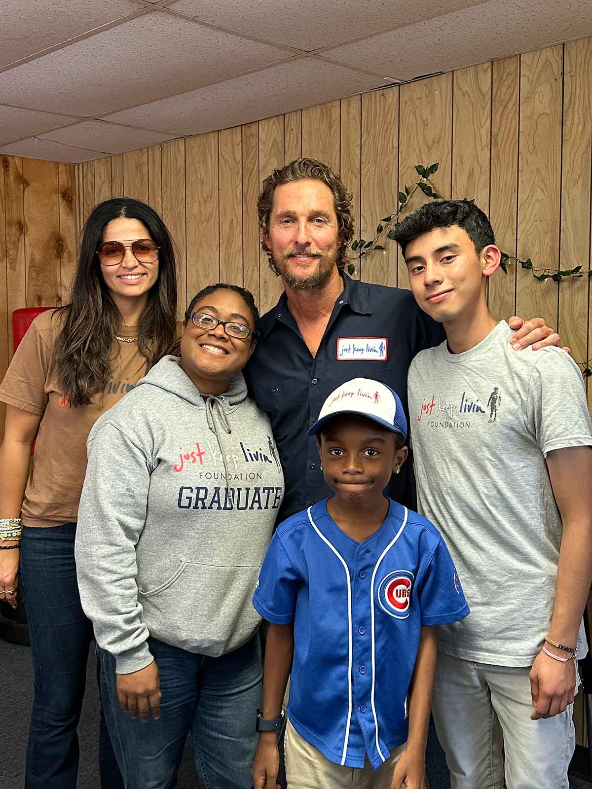 Camila and Matthew McConaughey with just keep livin students